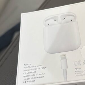 Apple AirPods with Charging Case - White